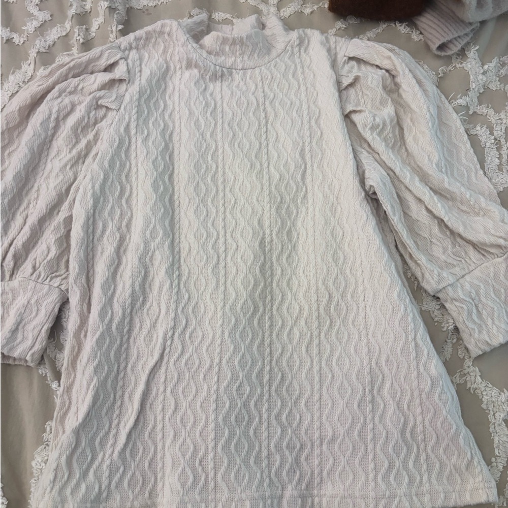 White textured short sleeve blouse.